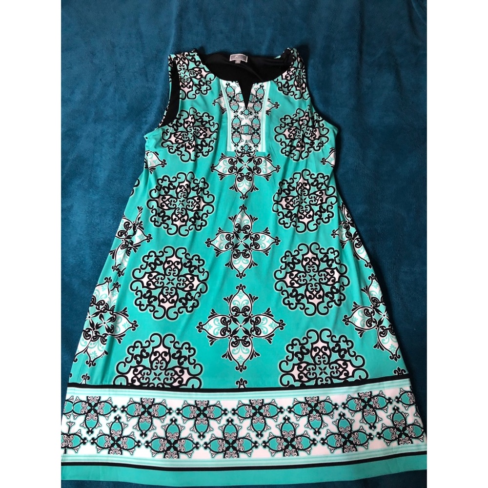 Teal dress with black and white designs